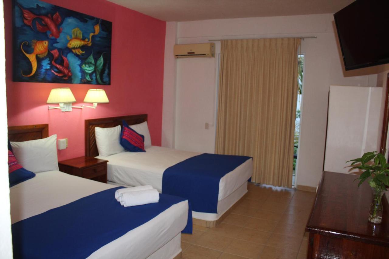 Hotel Arenas Del Pacifico Санта-Крус-Хуатулко Экстерьер фото