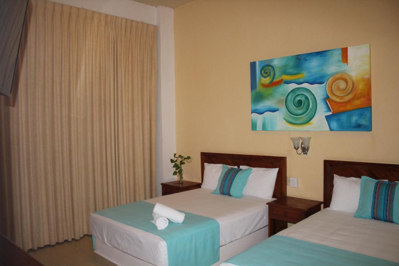 Hotel Arenas Del Pacifico Санта-Крус-Хуатулко Экстерьер фото