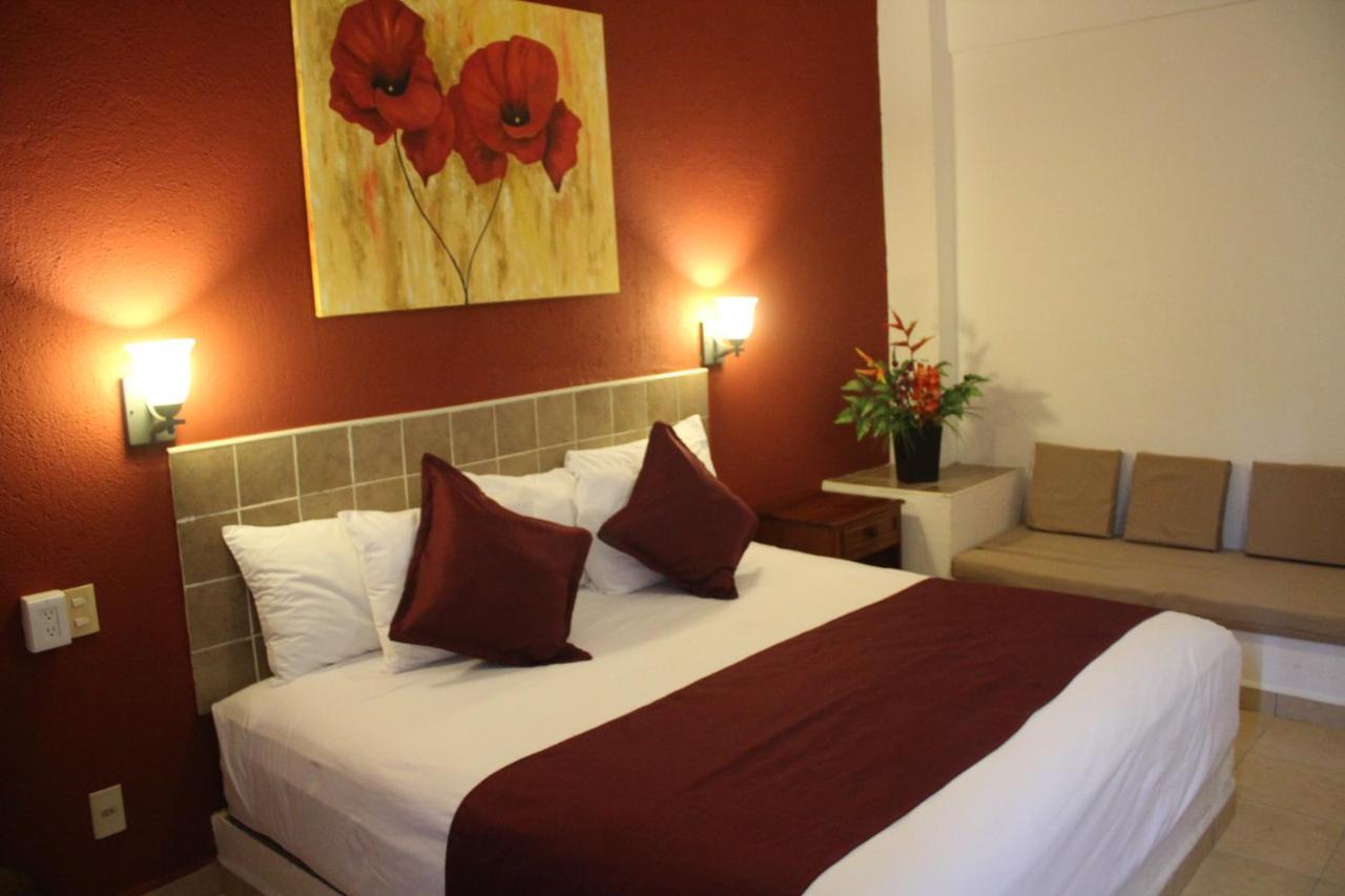 Hotel Arenas Del Pacifico Санта-Крус-Хуатулко Экстерьер фото