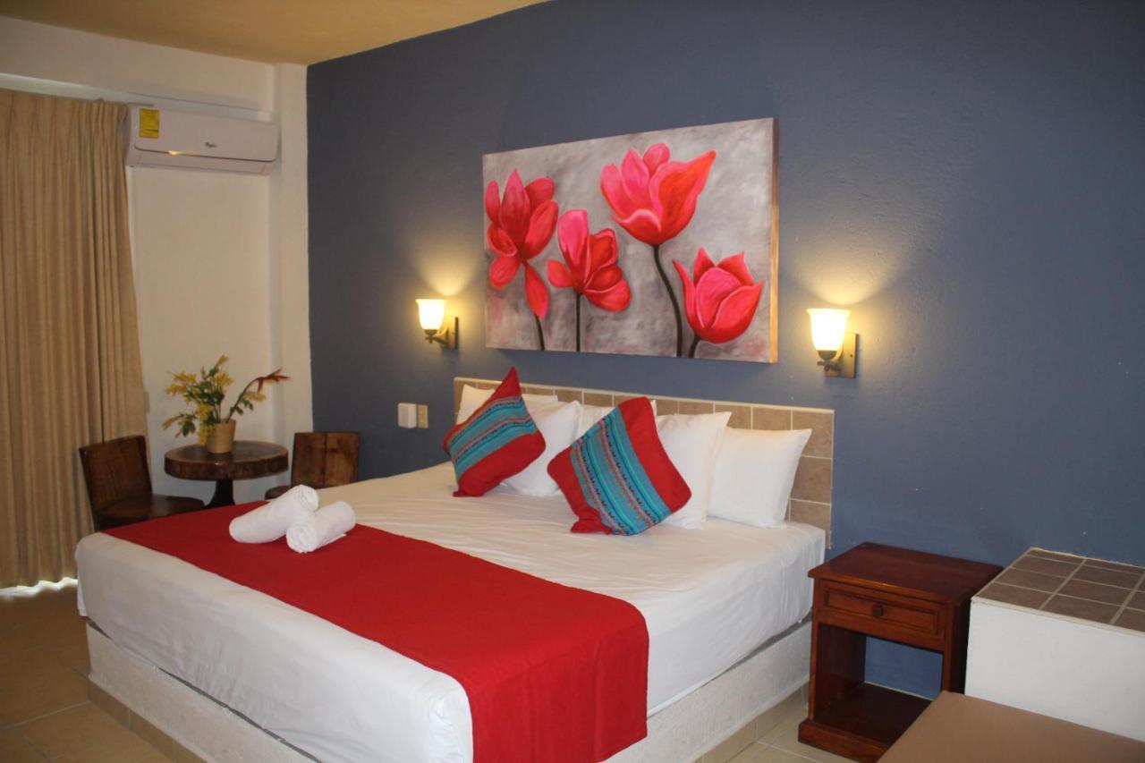 Hotel Arenas Del Pacifico Санта-Крус-Хуатулко Экстерьер фото