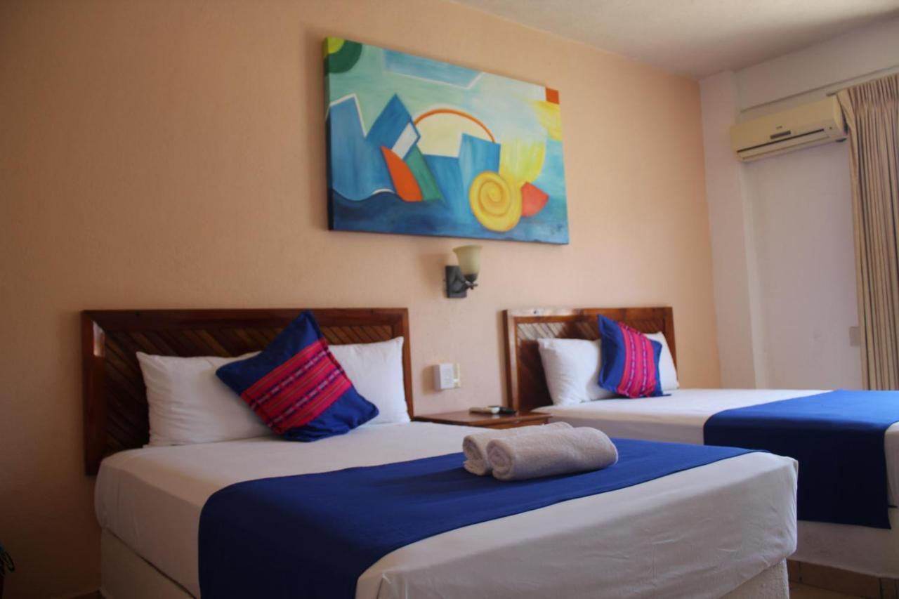 Hotel Arenas Del Pacifico Санта-Крус-Хуатулко Экстерьер фото