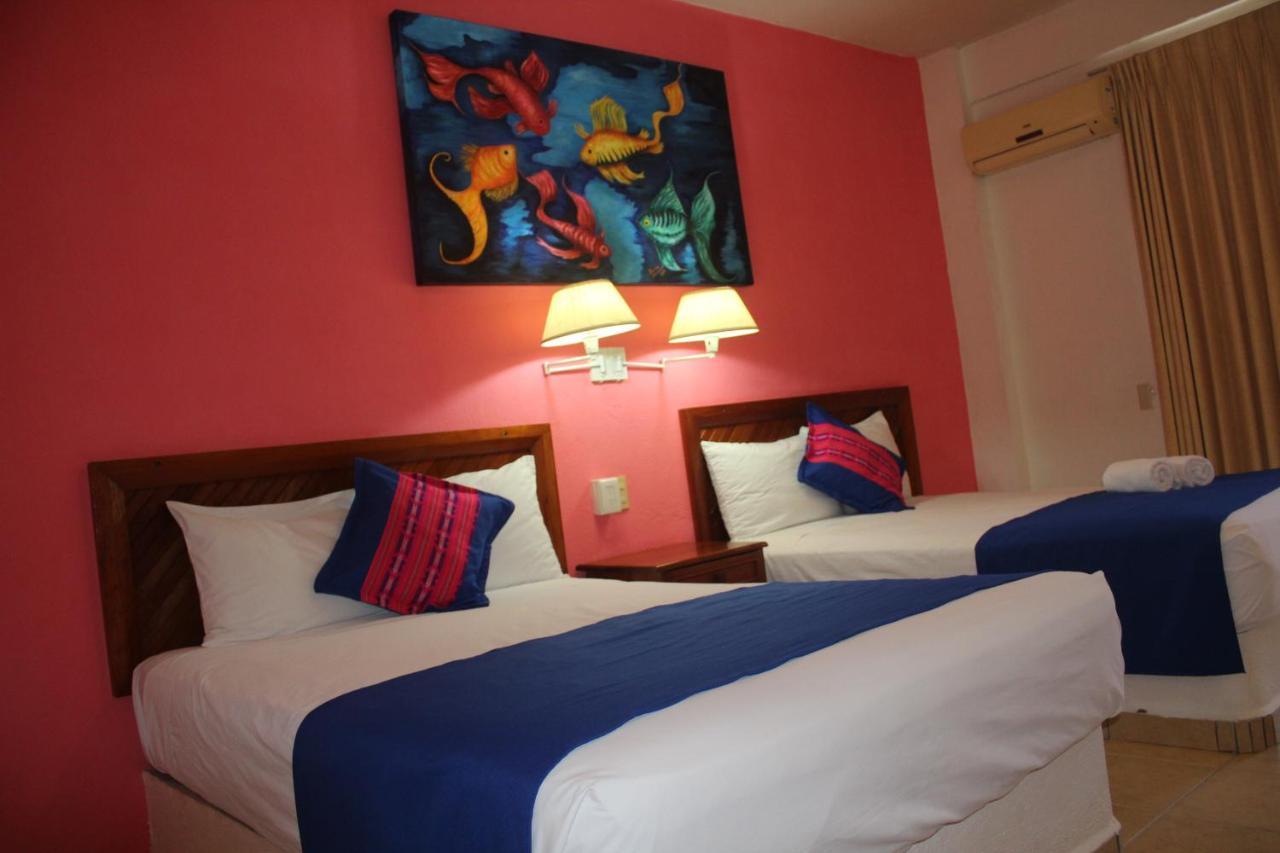 Hotel Arenas Del Pacifico Санта-Крус-Хуатулко Экстерьер фото