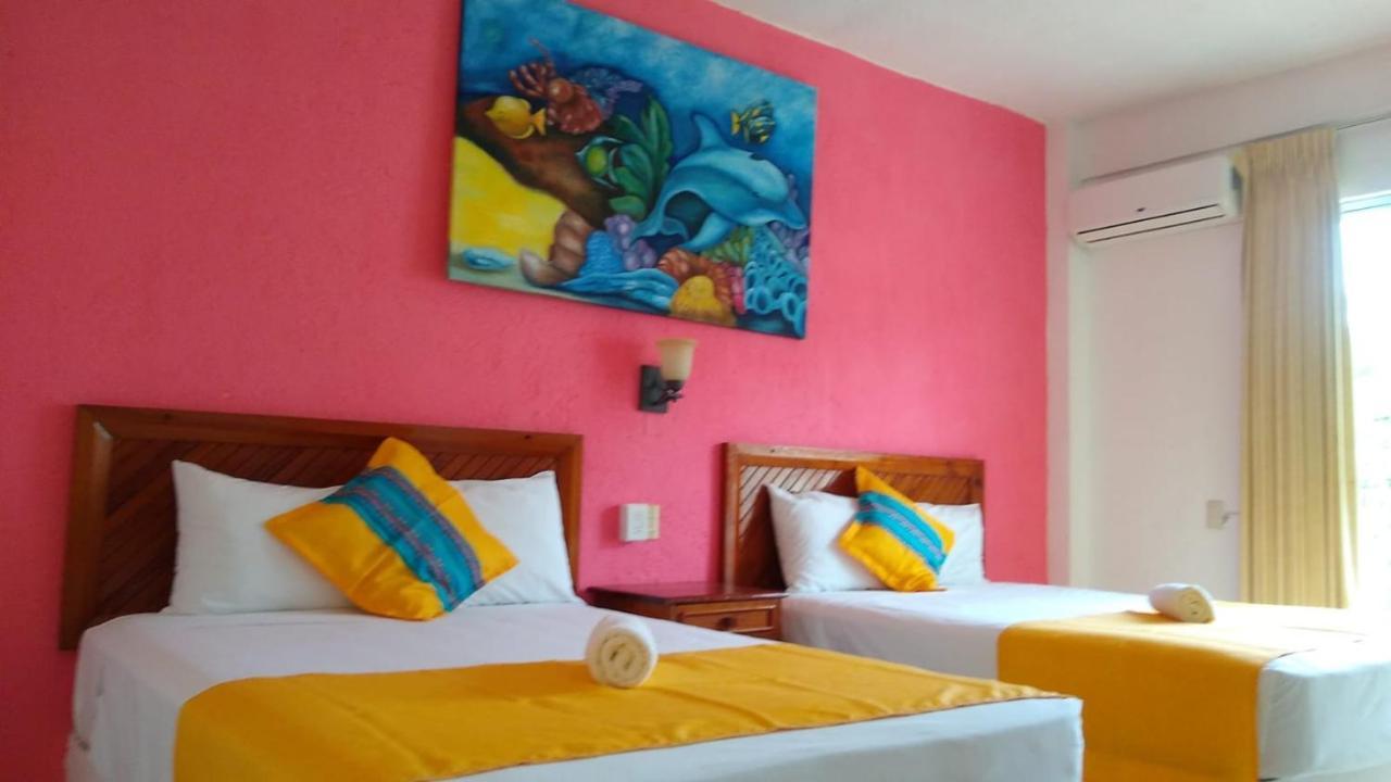 Hotel Arenas Del Pacifico Санта-Крус-Хуатулко Экстерьер фото
