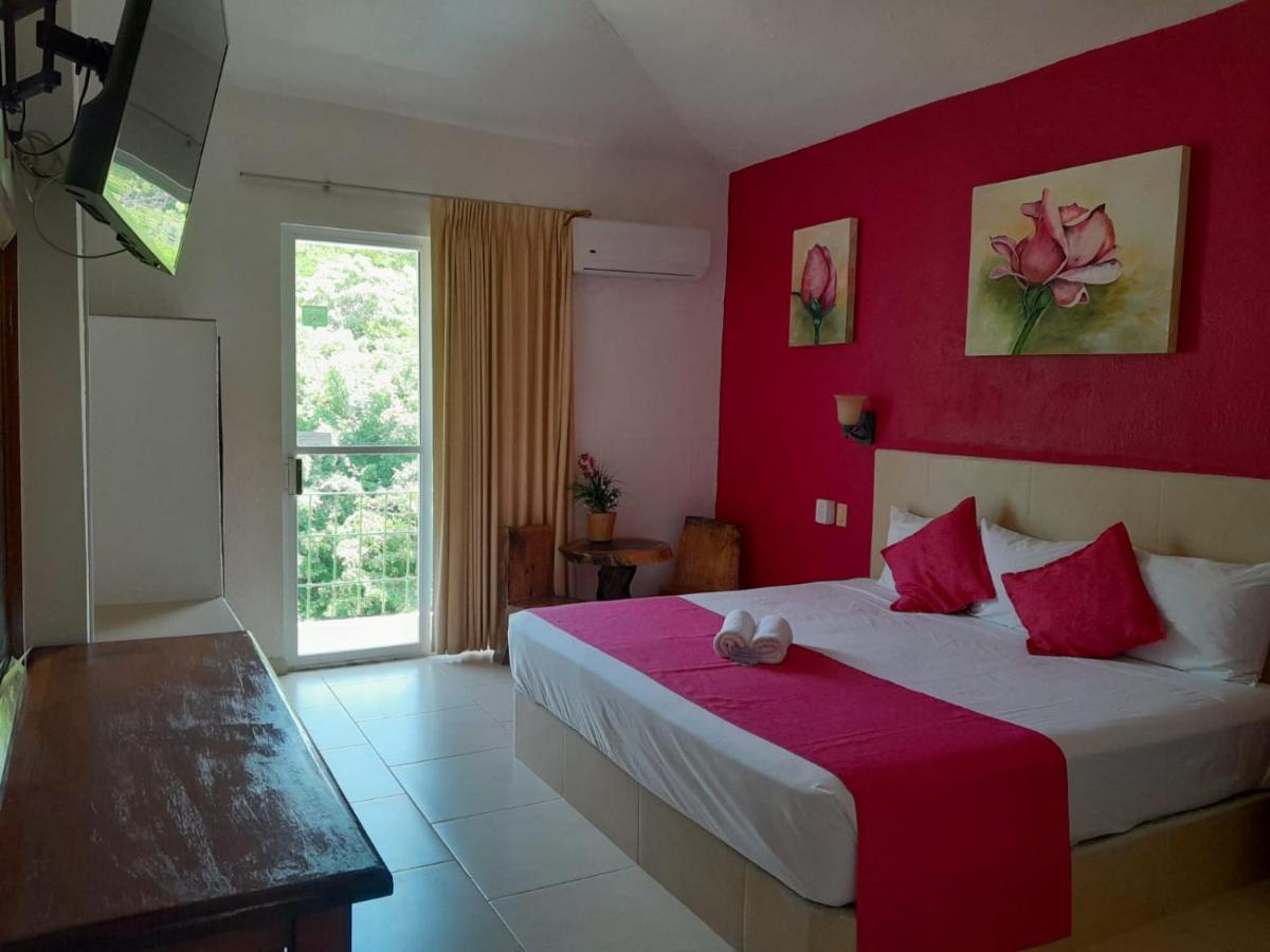 Hotel Arenas Del Pacifico Санта-Крус-Хуатулко Экстерьер фото