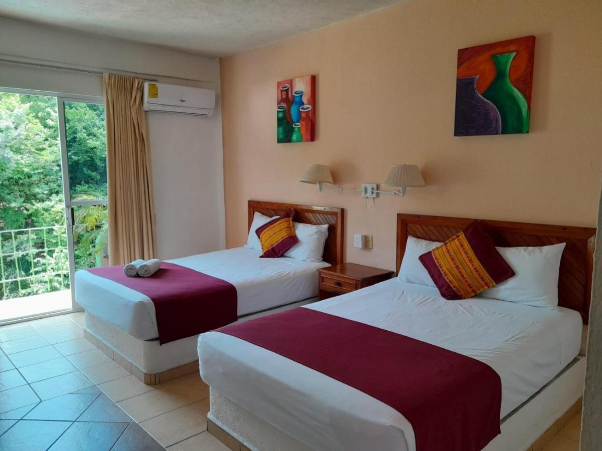 Hotel Arenas Del Pacifico Санта-Крус-Хуатулко Экстерьер фото
