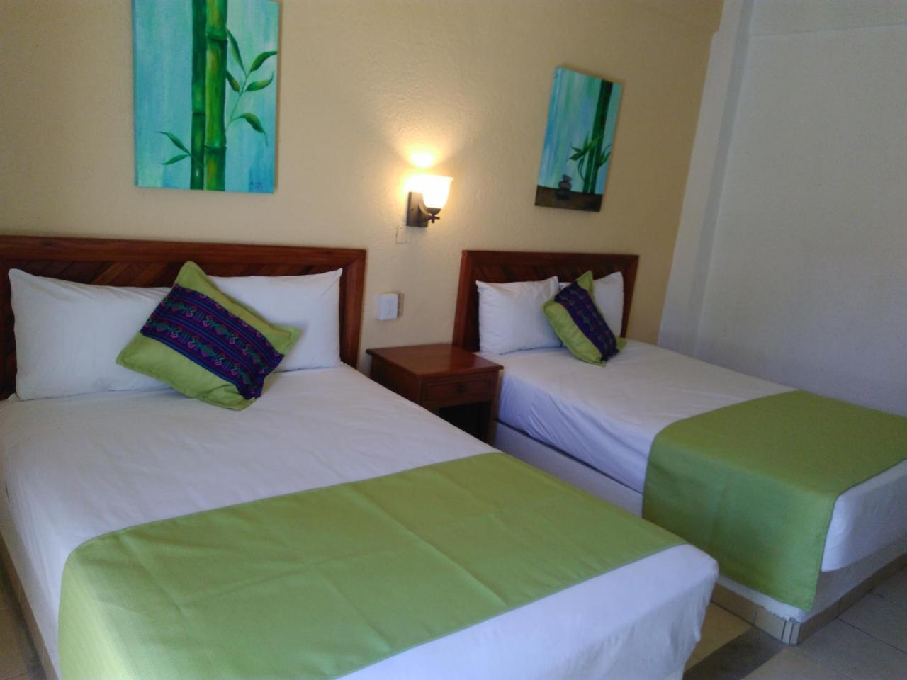 Hotel Arenas Del Pacifico Санта-Крус-Хуатулко Экстерьер фото
